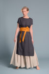 Linen obi belt MARU in turmeric color styled with a flowing dress