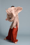 Natural mens linen scarf in an earthy tone, complementing a sustainable wardrobe.