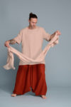 Minimalist and timeless unisex lightweight linen scarf styled with a neutral outfit.