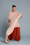 Casual styling of a linen scarf for men and women, adding a relaxed yet elegant touch to the outfit.