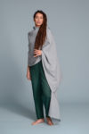 Unisex linen wrap shawl worn as a cozy layering piece