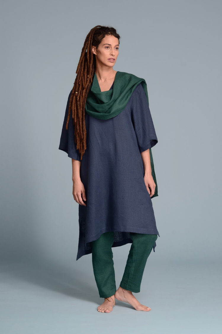 Model wearing a pure linen scarf wrapped around the neck