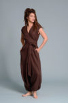 A model wearing the TALISE jumpsuit with harem pants, perfect for casual or elegant styling.