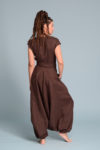 Back view of the Linen Wrap Jumpsuit TALISE, emphasizing its flowing silhouette and breathable linen fabric.
