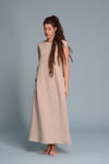 A lightweight linen dress in soft beige, featuring a relaxed A-line silhouette and short sleeves.