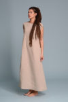 A lightweight linen dress in soft beige, perfect for warm-weather wear with its breezy fabric.