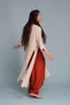 Side profile of the VARAU kimono showing its high side slits and flowing silhouette