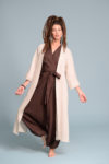 Model wearing the light natural flax kimono layered over a linen dress, perfect for summer days