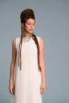 Close-up of the boat neckline, adding a refined and minimalist touch.