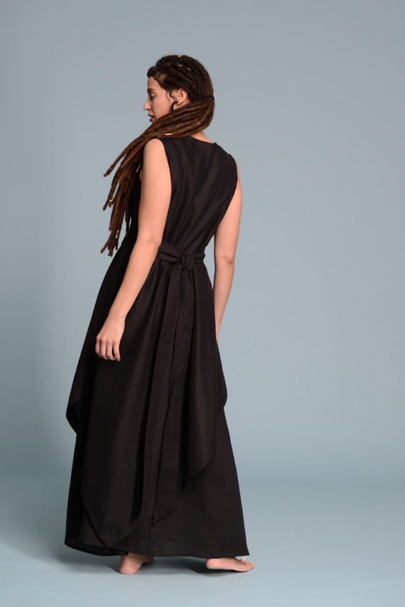 Back view of the Double Layered Linen Dress EFRAT, highlighting its elegant drape and sleeveless design