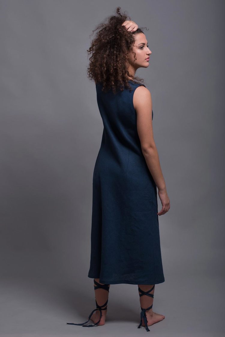 Back view of the ALICE dress in Midnight Blue, illustrating the seamless design and medium-weight linen fabric