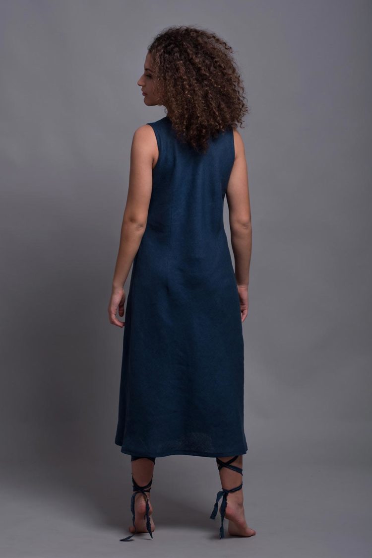 Model gracefully moving in the ALICE dress, demonstrating the flow of the A-line silhouette