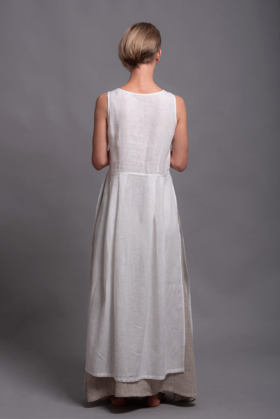 Back view of the Linen Tunic Dress NERO, emphasizing the straight hemline and lightweight fabric.