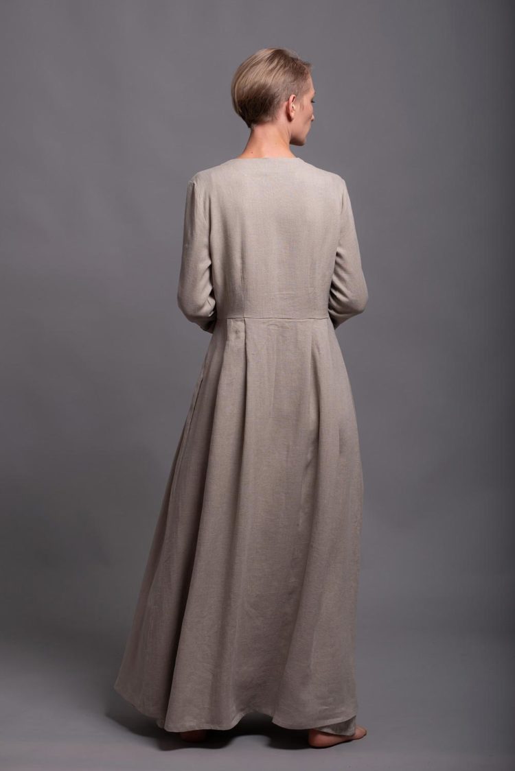 Minimalist and timeless women's linen coat with a relaxed fit.