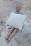 Stonewashed linen throw with frayed edges for rustic style