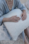 Close-up of breathable linen pillow cover fabric with stonewashed finish