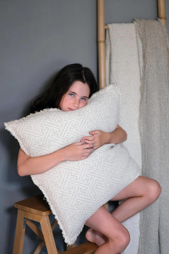 Decorative linen pillow cover for living room or bedroom with frayed edges