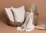 Handmade linen throw pillow cover in rustic minimalist home decor setting