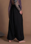 Black men's harem pants with a drop-crotch design, perfect for summer wear
