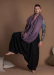 Lightweight linen harem pants in black, styled for a relaxed fit