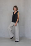 Model wearing the BORA Straight Wide-Leg Linen Pants in Natural Flax, paired with a top for a relaxed, elegant look.
